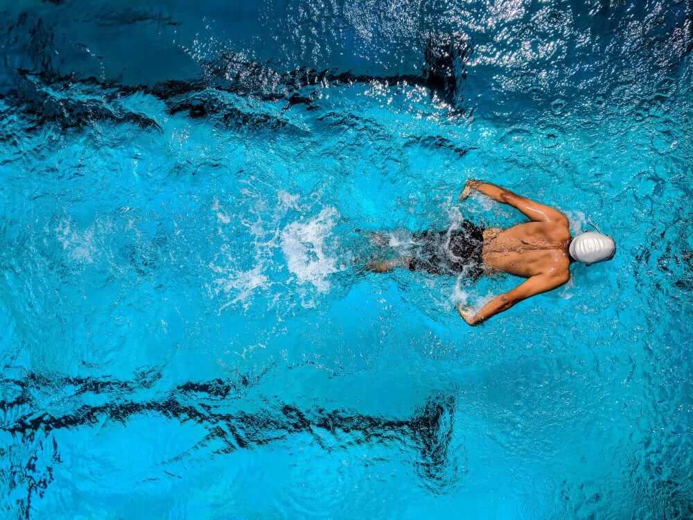 Gentlemen swimming in a pool